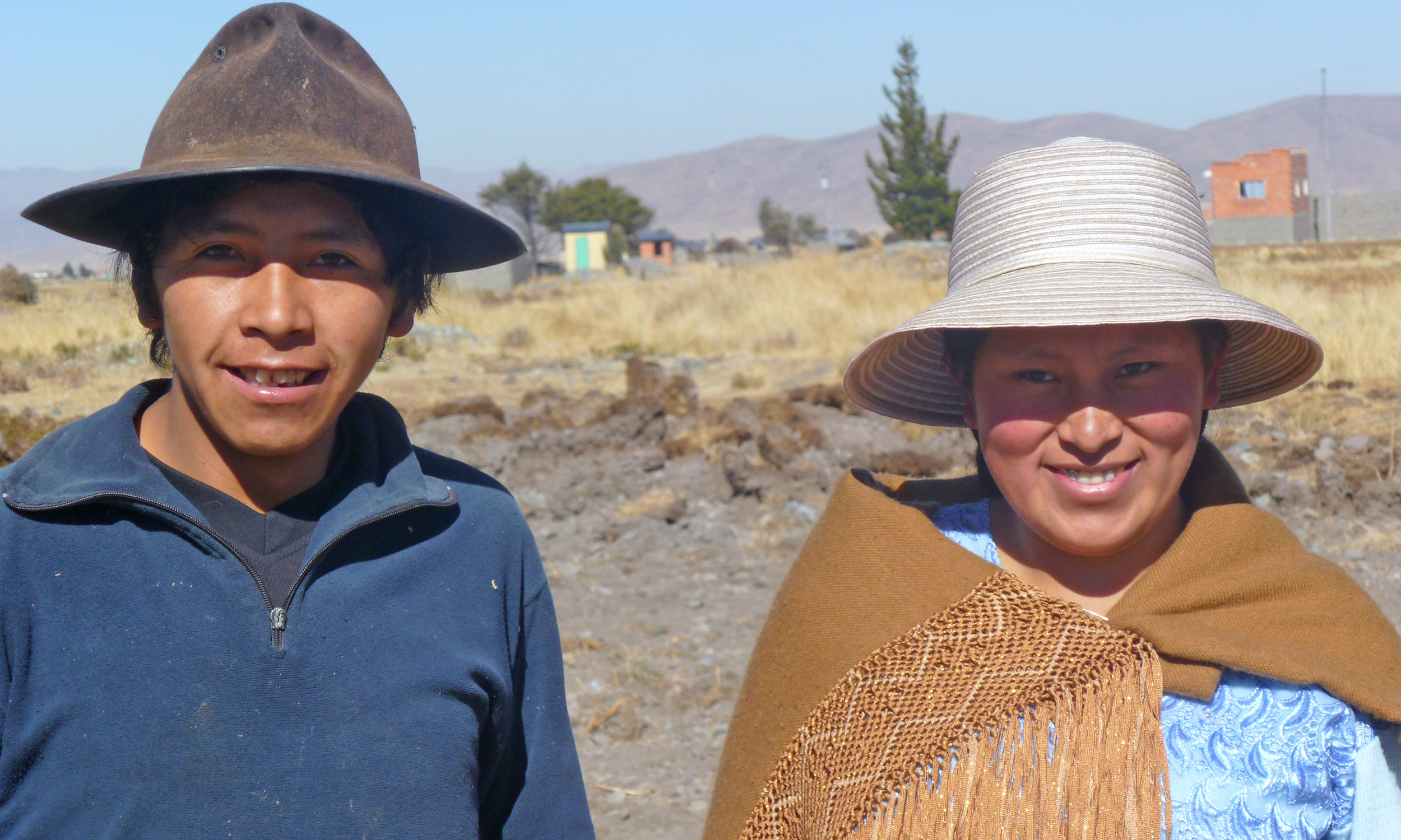 A man and a woman in wide-brim hats in Bolivia